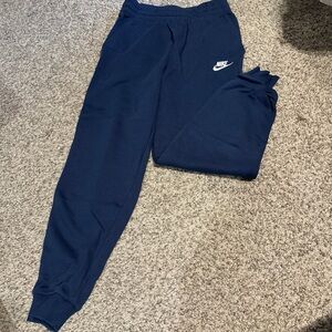 Navy Nike size Youth L sweatpants.